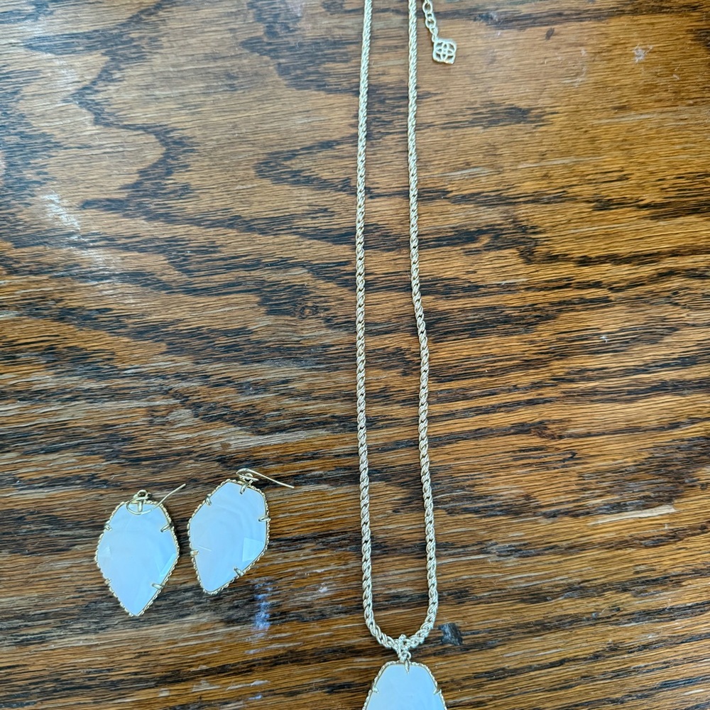 Kendra Scott gold necklace with pendant and earrings